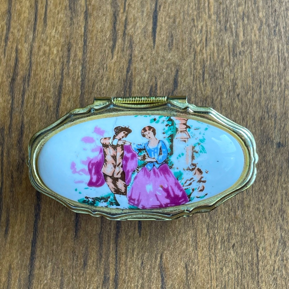 Vintage Victorian style porcelain painted lipstick holder and mirror combo.